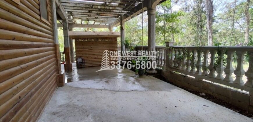Venta de Terreno con Casa y Naciente de Agua en Omoa Cortes Honduras
