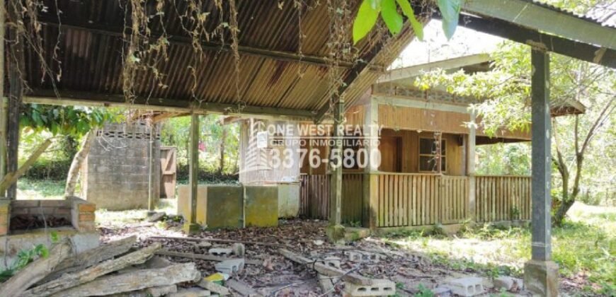 Venta de Terreno con Casa y Naciente de Agua en Omoa Cortes Honduras