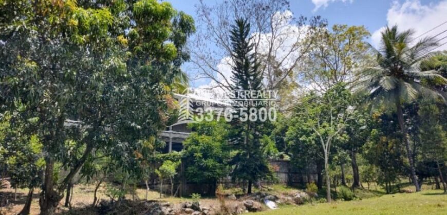 Venta de Terreno con Casa y Naciente de Agua en Omoa Cortes Honduras