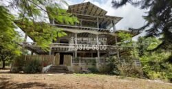 Venta de Terreno con Casa y Naciente de Agua en Omoa Cortes Honduras