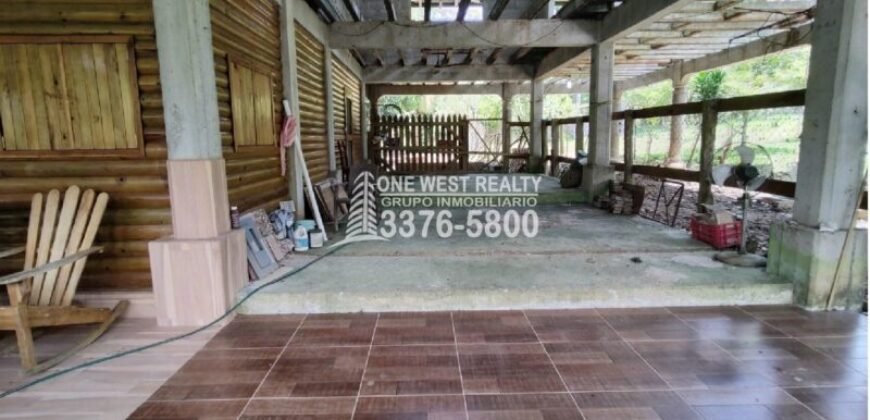Venta de Terreno con Casa y Naciente de Agua en Omoa Cortes Honduras