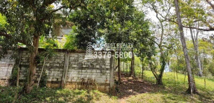 Venta de Terreno con Casa y Naciente de Agua en Omoa Cortes Honduras