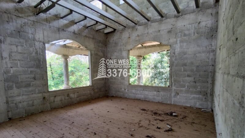 Terreno de venta en Omoa Cortes con naciente de agua y cabañas