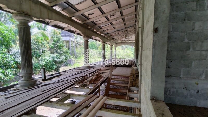 Terreno de venta en Omoa Cortes con naciente de agua y cabañas