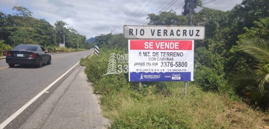 Terreno de venta en Omoa Cortes con naciente de agua y cabañas