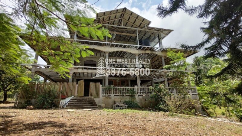 Terreno de venta en Omoa Cortes con naciente de agua y cabañas