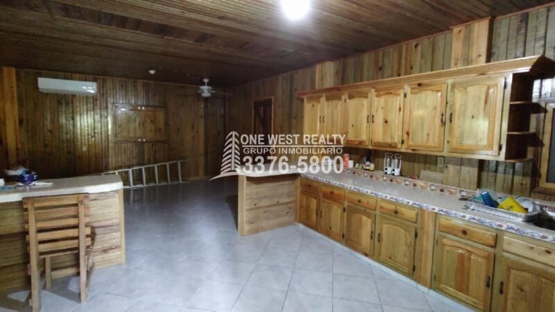 Terreno de venta en Omoa Cortes con naciente de agua y cabañas