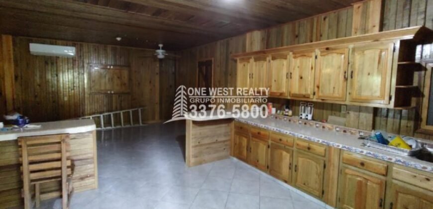 Terreno de venta en Omoa Cortes con naciente de agua y cabañas