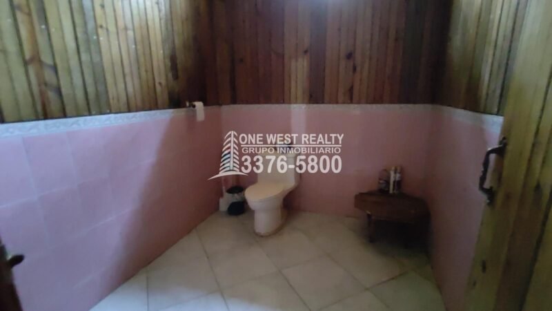 Terreno de venta en Omoa Cortes con naciente de agua y cabañas